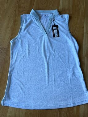 Footjoy NWT women’s sleevless golf polo green and white size small open neck